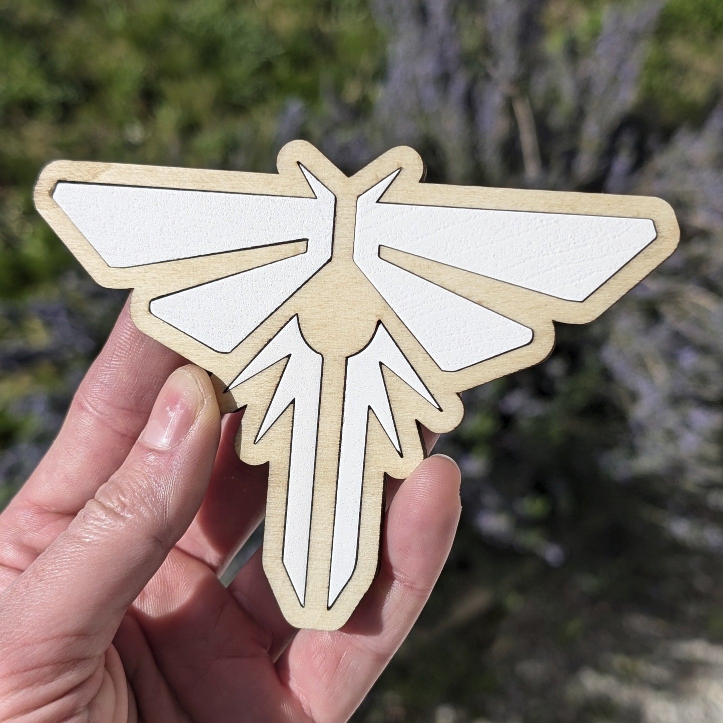 Design fidèle au symbole des Lucioles