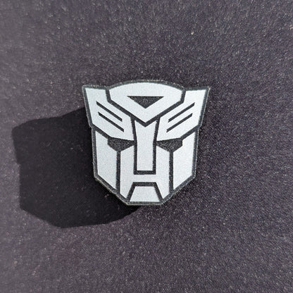 Broches Transformers & Decepticon