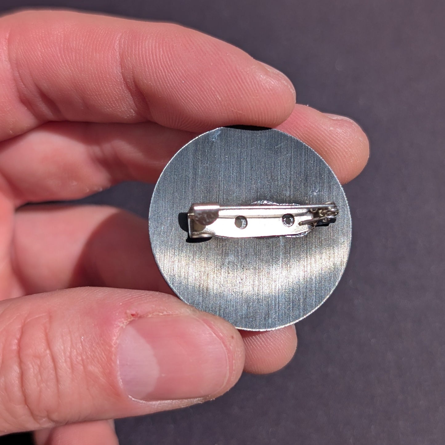 Broche NERV